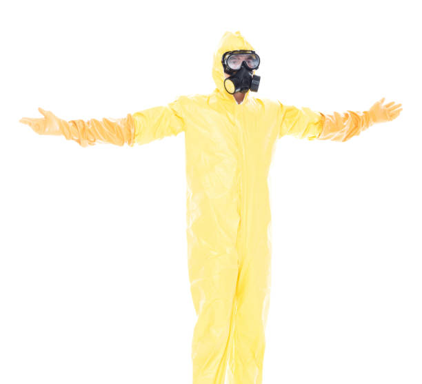 istock Man in protective clothing with arms outstretched 1153647100