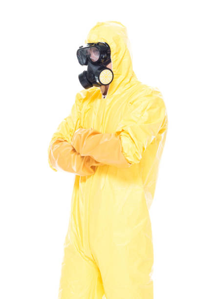 istock Man in protective clothing with arms folded 1153647134