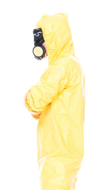 istock Man in protective clothing with arms folded 1153647142