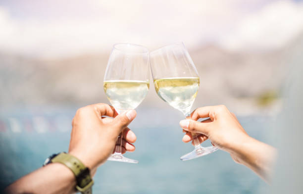 istock Enjoying wine by the sea. 1153647196