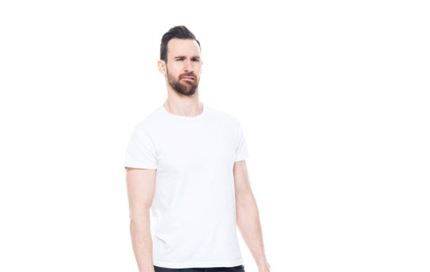 istock Handsome man in white shirt and jeans 1153649967