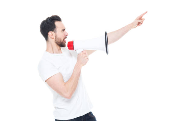 istock Handsome man in white shirt and jeans 1153650007