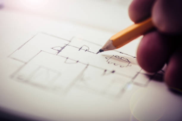 Architect sketching the plan of a house