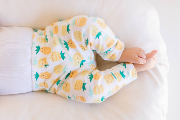 istock Pineapple Pants on Baby Legs 1153656980