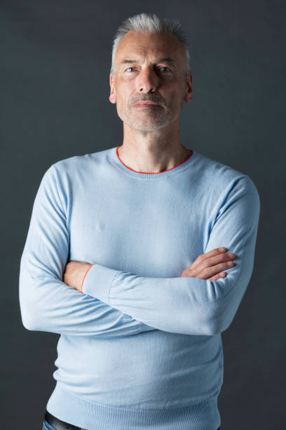 istock Grey-haired man in his 50s. 1153657389