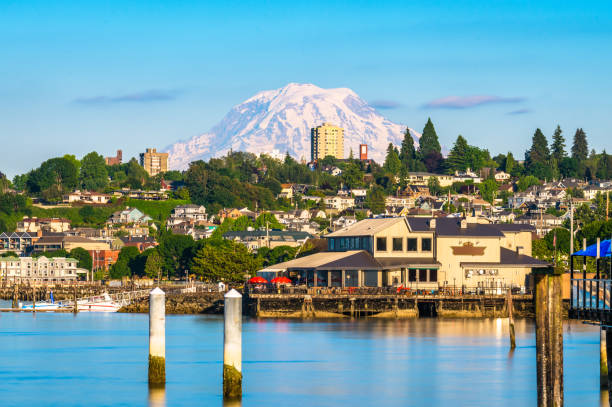 Tacoma, Washington, USA Tacoma, Washington, USA with Mt. Rainier in the distance on Commencement Bay. waters edge stock pictures, royalty-free photos & images