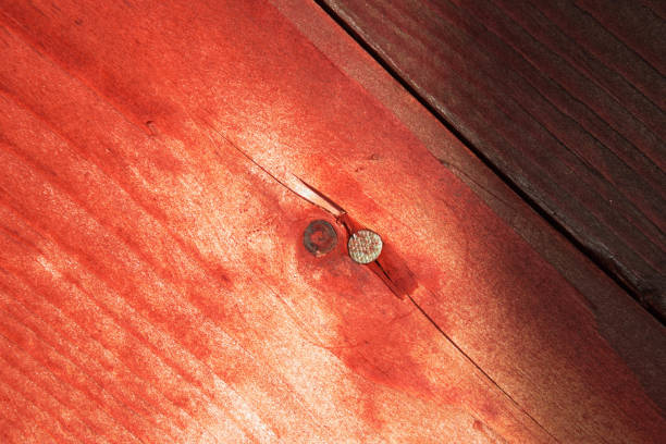 istock natural wooden orange red plank background with shadow 1153658945