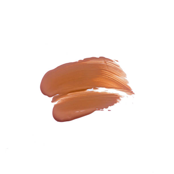 istock Texture of deep brown liquid foundation.Liquid foundation smudges isolated on white background. 1153661820