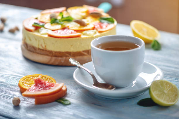 istock Raw citrus cake with grapefruit, orange, lime and lemon with nuts and mint. Fresh summer dessert. Gluten free vegan food 1153662593
