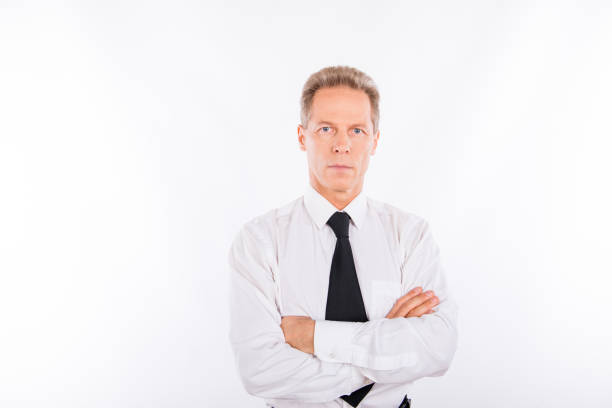 a secure businessman in a white shirt and black tie - old human face men ceo imagens e fotografias de stock