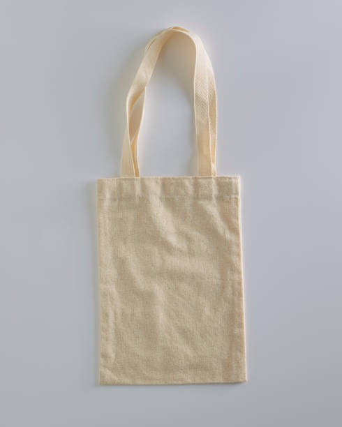 istock White tote bag canvas fabric cloth eco shopping sack mockup 1153665436