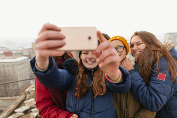 istock Teenagers making selfie outdoors 1153665716