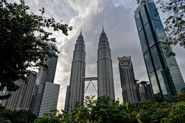istock Petronas Towers surrounded by other office buildings 1153666305