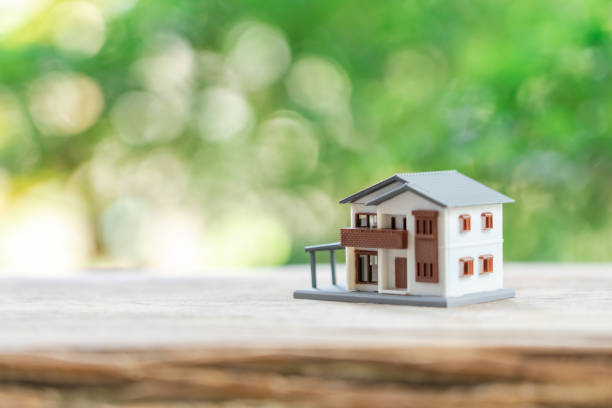 istock a model house model .using as background business concept and real estate concept with copy space for your text or design. 1153672508