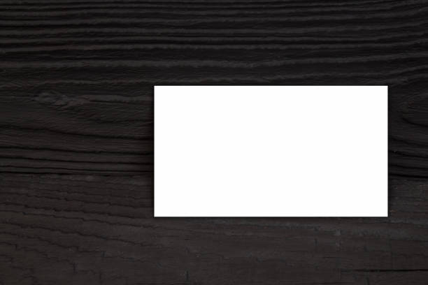 istock Blank business cards on the wooden table. Template for ID. Top view. 1153676021