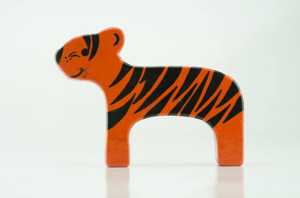istock Wooden Tiger on White 1153681289