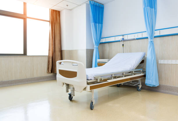 istock Interior of new empty hospital room 1153683565