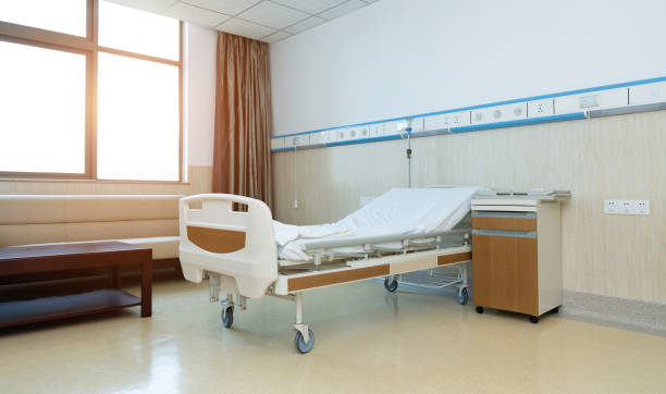 istock Interior of new empty hospital room 1153684389