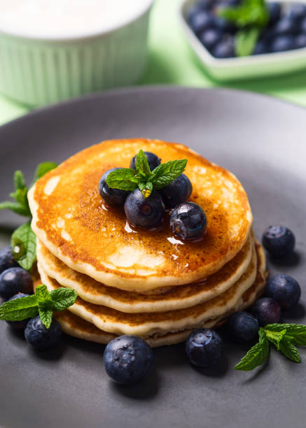 istock Home made pancakes served with fresh berries 1153684770