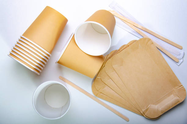 istock Paper cup for coffee, disposable ecological coffee supplies. White table. Top view. 1153685952