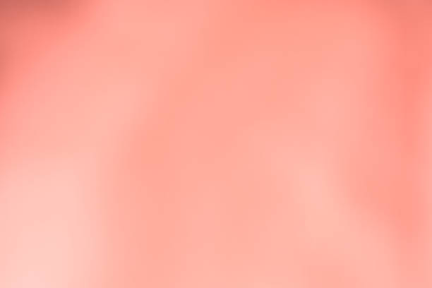istock Abstract coral pink color blurred background 1153687299