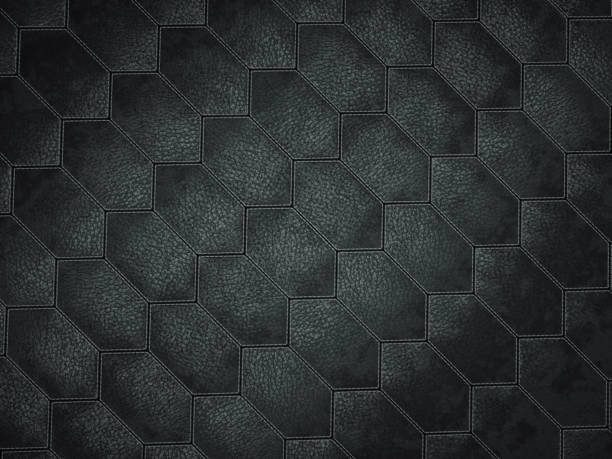 istock Leather stitched hexagon or honecomb black shiny texture or background 1153688783