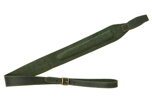 istock leather green shoulder strap for a gun isolated on white background 1153688835