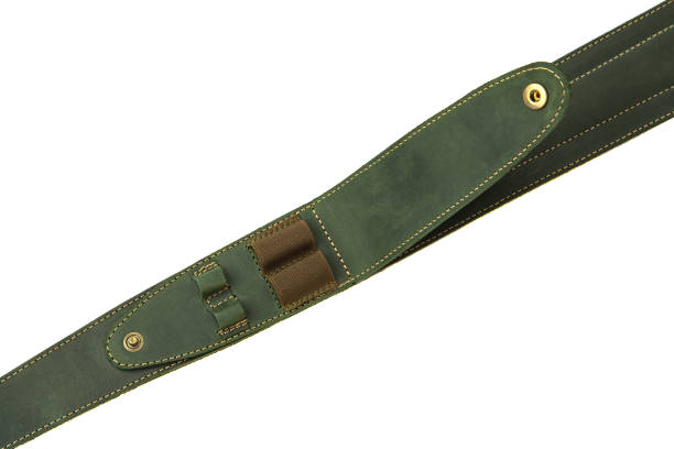 istock leather green shoulder strap for a gun isolated on white background 1153688846