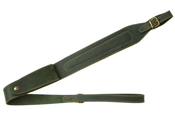 istock leather green shoulder strap for a gun isolated on white background 1153688850