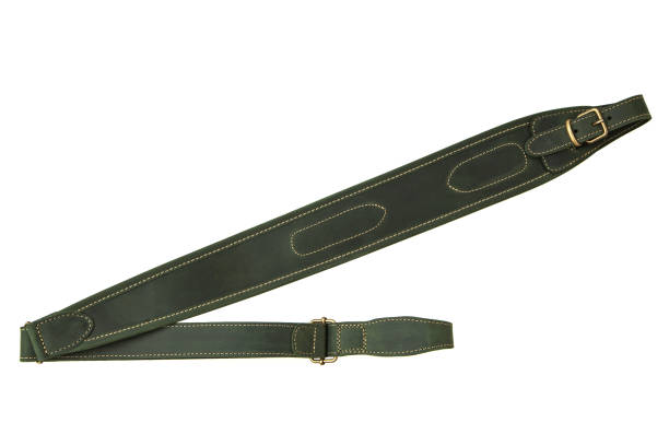 istock leather green shoulder strap for a gun isolated on white background 1153688856