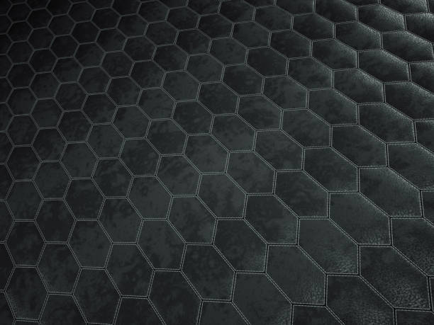 istock Leather stitched hexagon or honecomb black shiny texture or background 1153689040