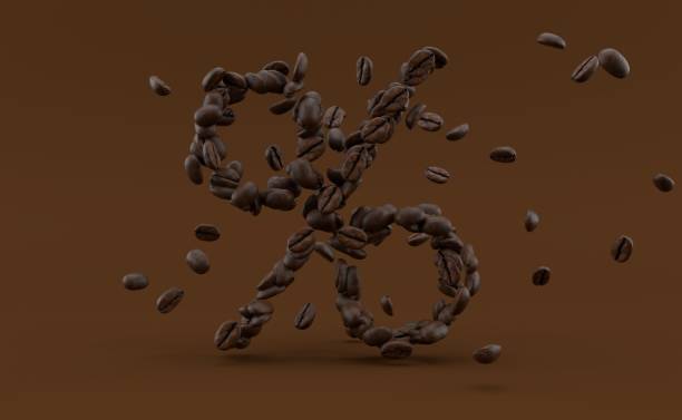 Coffee seeds in percent symbol shape stock photo