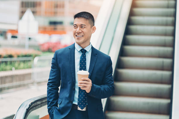 istock Smiling businessman in Hong Kong 1153689520