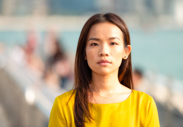 Confident outdoor headshot A portrait of a woman in her early thirties, taken in Hong Kong. chinese woman stock pictures, royalty-free photos & images