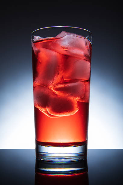 istock Red cocktail with ice, isolated tall glass 1153694216