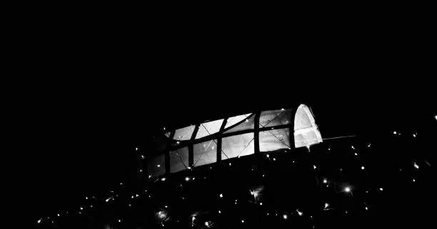 A white artificial showpiece boat at night unique photo