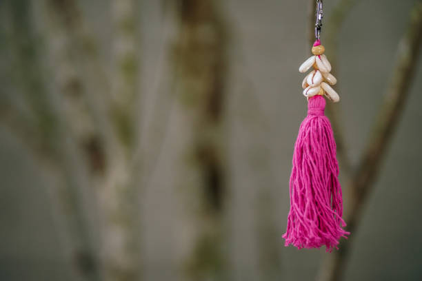 Close-up Shot of a Pink Seashell Key Chain