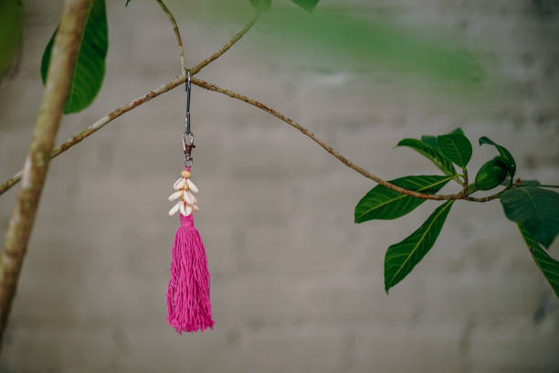 istock Pink Seashell Key Chain Displayed for Sale 1153695089