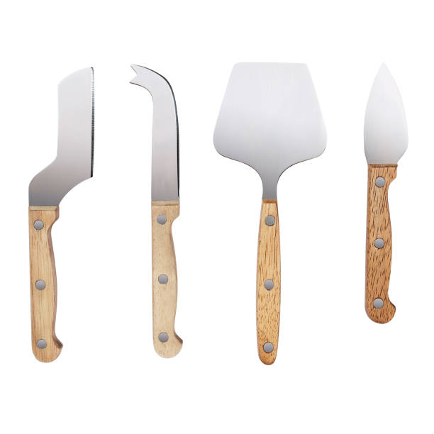 istock Four different types of cheese knives, isolated on white with clipping path 1153695113