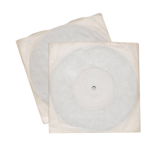istock Two old vinyl single records discs in plain sleeves 1153695193