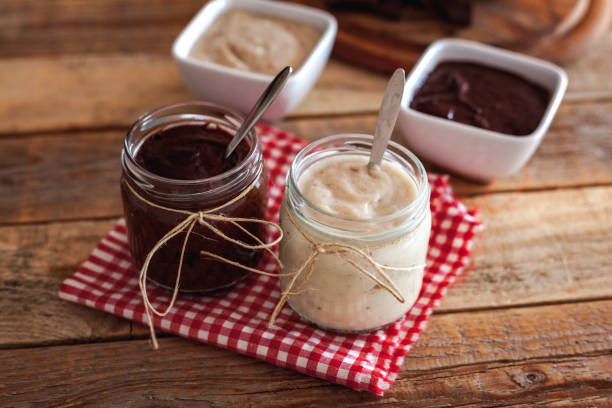istock Chocolate pudding in glass jar, close-up 1153696280