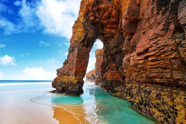 Playa Las Cathedrals Cathedral beach in Galicia Spain Playa las catedrales Catedrais beach in Ribadeo Galicia of Lugo Spain cathedrals stock pictures, royalty-free photos & images