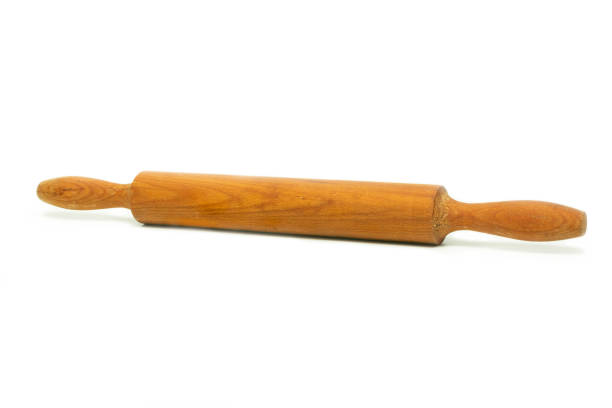 istock old wooden kneading stick isolated on white background 1153697507
