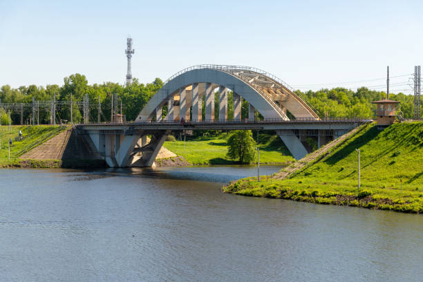 istock Railway bridge over the river in Khimki city, Russia 1153704503