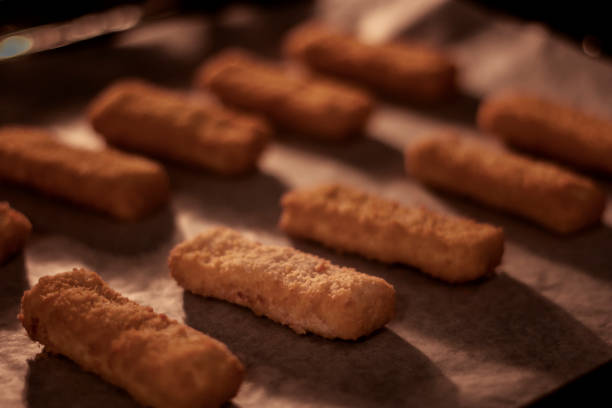 istock Fish fillet sticks cooked in the oven 1153704522