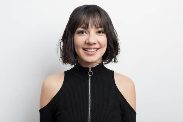 istock Young woman smiling 1153704527