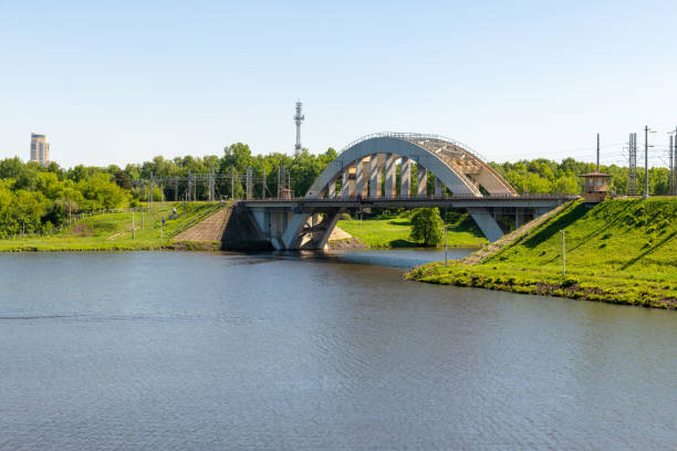 istock Railway bridge over the river in Khimki city, Russia 1153704537