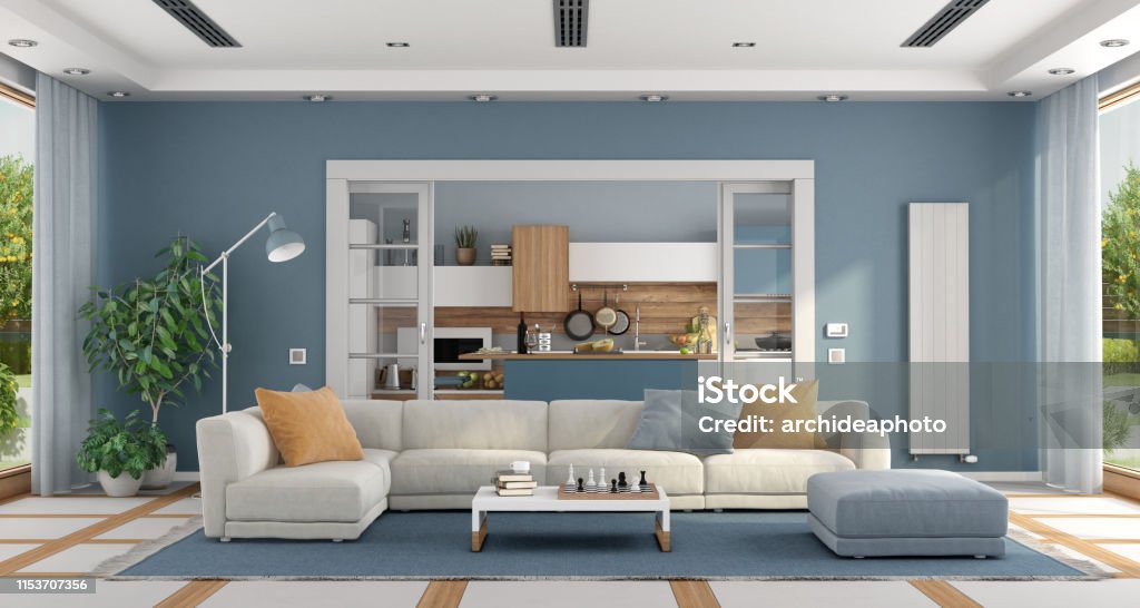 Living room with sofa and modern kitchen on background Large Living room with elegant sofa and modern kitchen on background - 3d rendering
the room does not exist in reality, Property model is not necessary Living Room Stock Photo