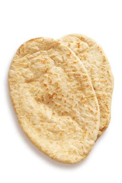 Pitta bread isolated on white with clipping path Pitta bread isolated on white with clipping path pita bread isolated stock pictures, royalty-free photos & images