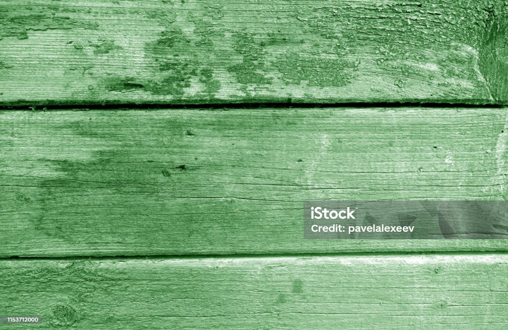 Weathered wooden painted wall in green tone. Weathered wooden painted wall in green tone. Abstract background and texture for design. Abstract Stock Photo
